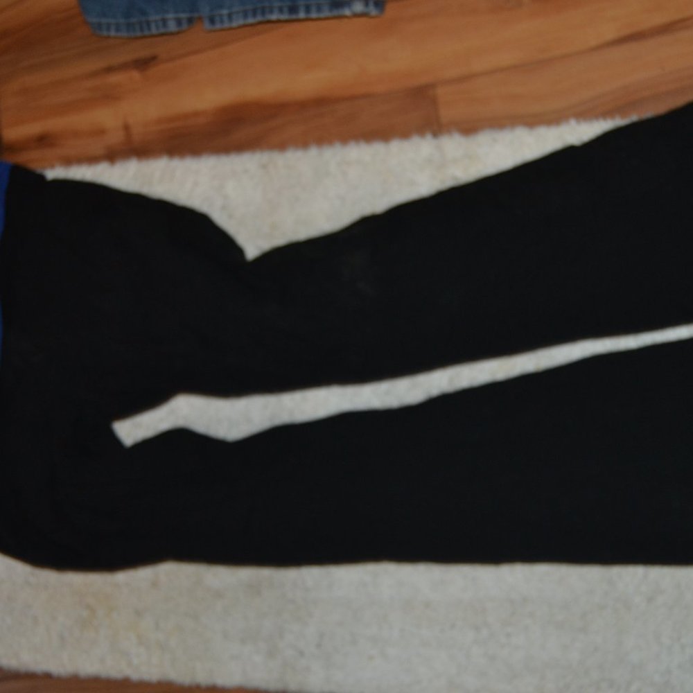Black with a blue waistband that folds down.
